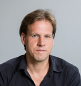 A person in a black shirt

AI-generated content may be incorrect.